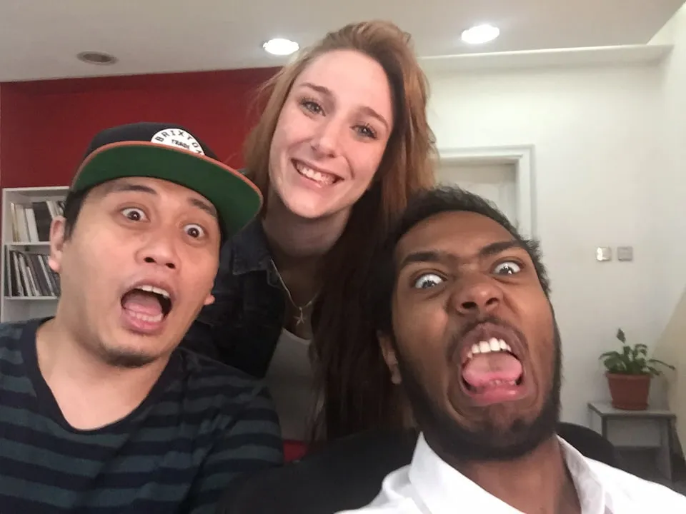 Eli, Jessica, and me horsing around at work