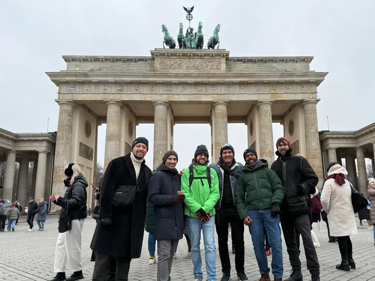 A bunch of developers in Berlin in front of the Brandenburg Gate